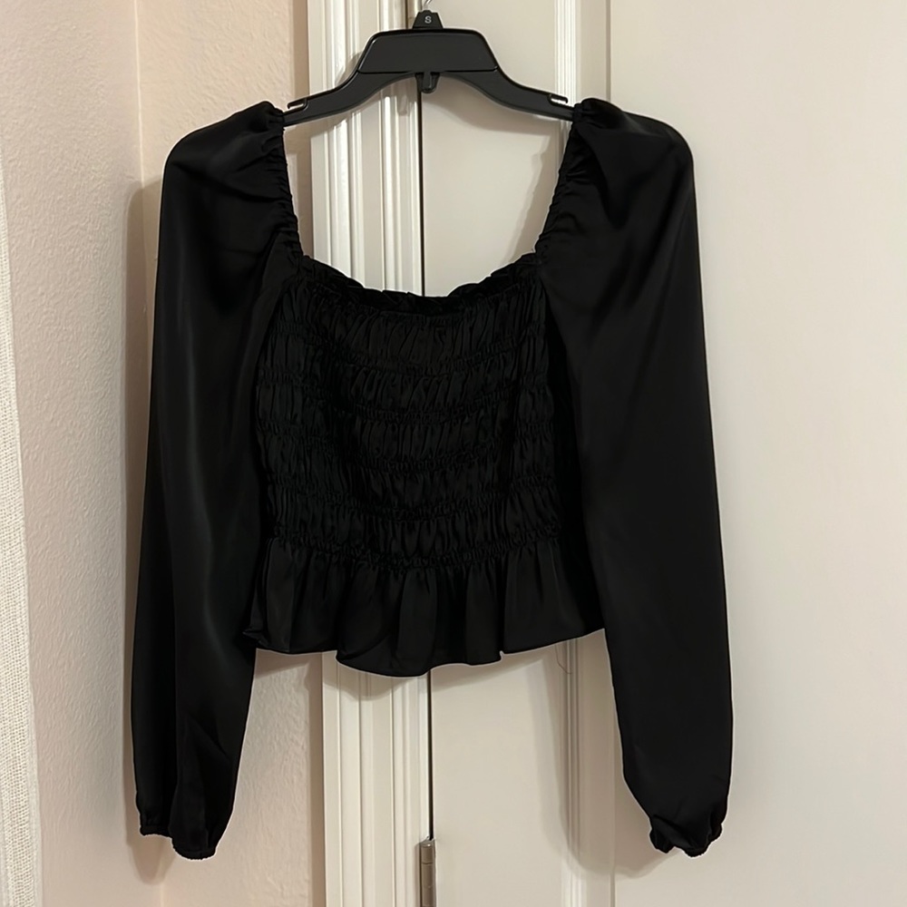Women’s black satin top